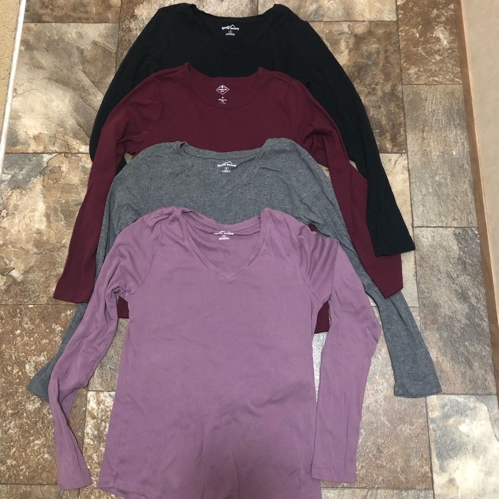 Ladies size medium long sleeve shirts.